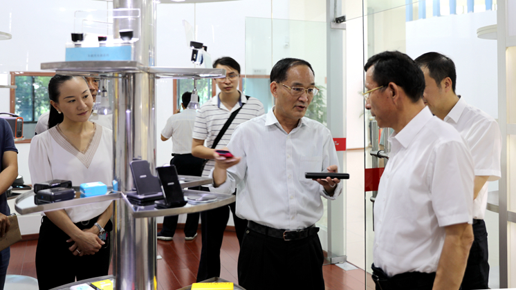 市委常委、市委統戰部部長歐陽鋒調研炬神電子